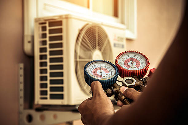 Professional Heat Pump Repair technician working in Minster, OH